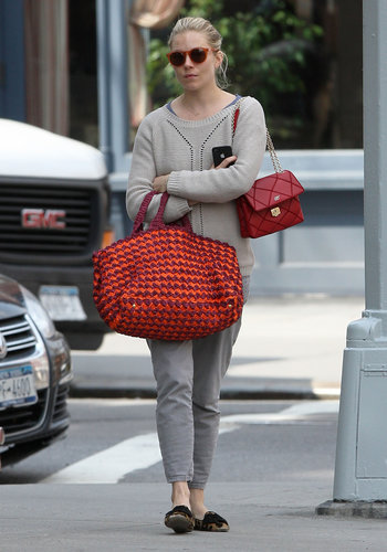 Sienna Miller looked laid back in gray cropped jeans, a knit sweater, round sunglasses, a large crochet bag, another smaller red Roger Vivier purse, and her trusty leopard loafers in NYC.
Sienna Miller looked laid back in gray cropped jeans, a knit sweater, round sunglasses, a large crochet bag, another smaller red Roger Vivier purse, and her trusty leopard loafers in NYC.