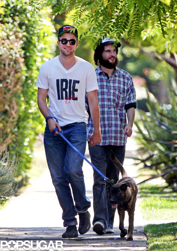 Robert Pattinson took Bear, a dog he adopted in New Orleans, for a guys' walk in LA in July 2011 with Tom Sturridge.
Robert Pattinson took Bear, a dog he adopted in New Orleans, for a guys' walk in LA in July 2011 with Tom Sturridge.