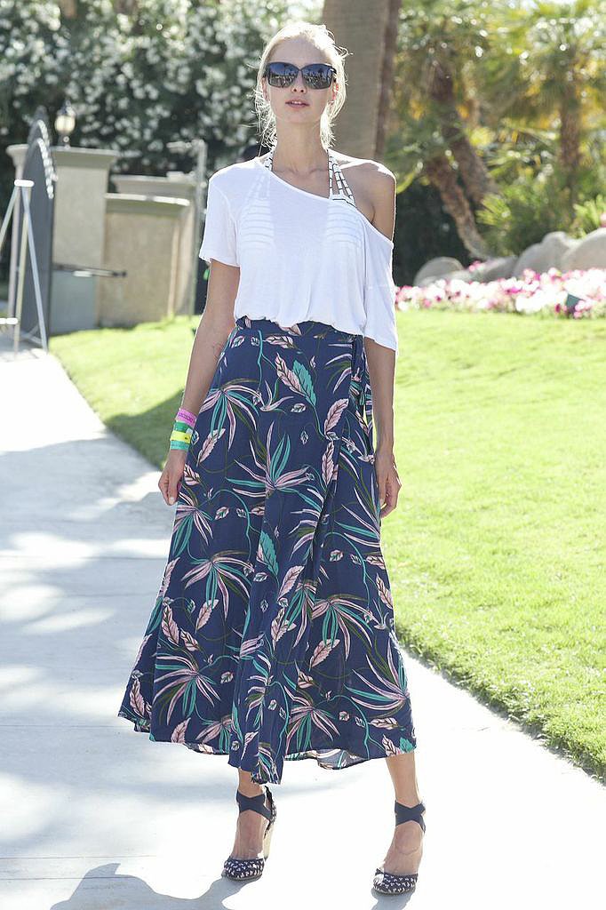 Studded footwear added a dose of edge to this flowy Coachella party look.
Studded footwear added a dose of edge to this flowy Coachella party look.