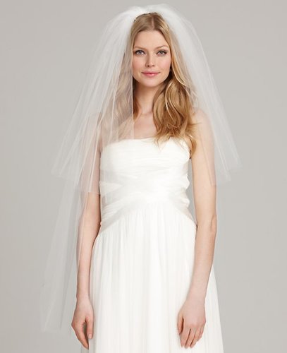 Ann Taylor's two-tier veil ($200) features a diaphanous two-layer tulle detailing, fitting for a variety of wedding dress silhouettes.
Ann Taylor's two-tier veil ($200) features a diaphanous two-layer tulle detailing, fitting for a variety of wedding dress silhouettes.