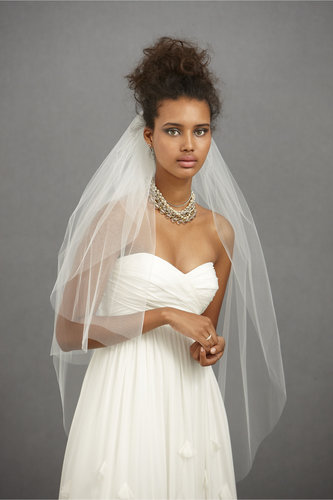 Debra Moreland's Seaspray veil ($240) is fingertip length and can be worn with one layer over the face or both layers along the back of the head.
Debra Moreland's Seaspray veil ($240) is fingertip length and can be worn with one layer over the face or both layers along the back of the head.