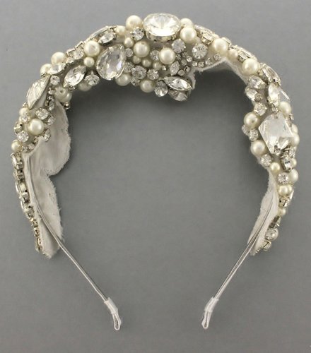 Wear this Camilla Christine Reagan beaded rhinestone headband ($178) with a veil for an extradramatic effect, or wear it by itself with your hair pulled back in a sleek bun.
Wear this Camilla Christine Reagan beaded rhinestone headband ($178) with a veil for an extradramatic effect, or wear it by itself with your hair pulled back in a sleek bun.