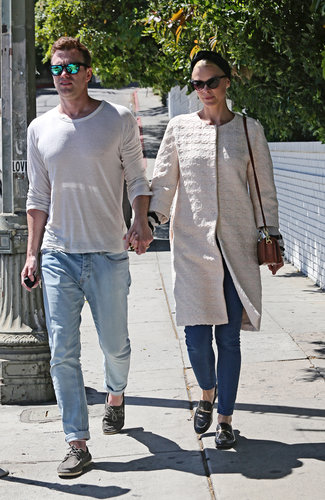 Jaime King took a sunny stroll in LA with her husband in cropped denim and black loafers with a Springy collarless coat, retro cat-eye sunglasses, and a turban-inspired headband.
Jaime King took a sunny stroll in LA with her husband in cropped denim and black loafers with a Springy collarless coat, retro cat-eye sunglasses, and a turban-inspired headband.