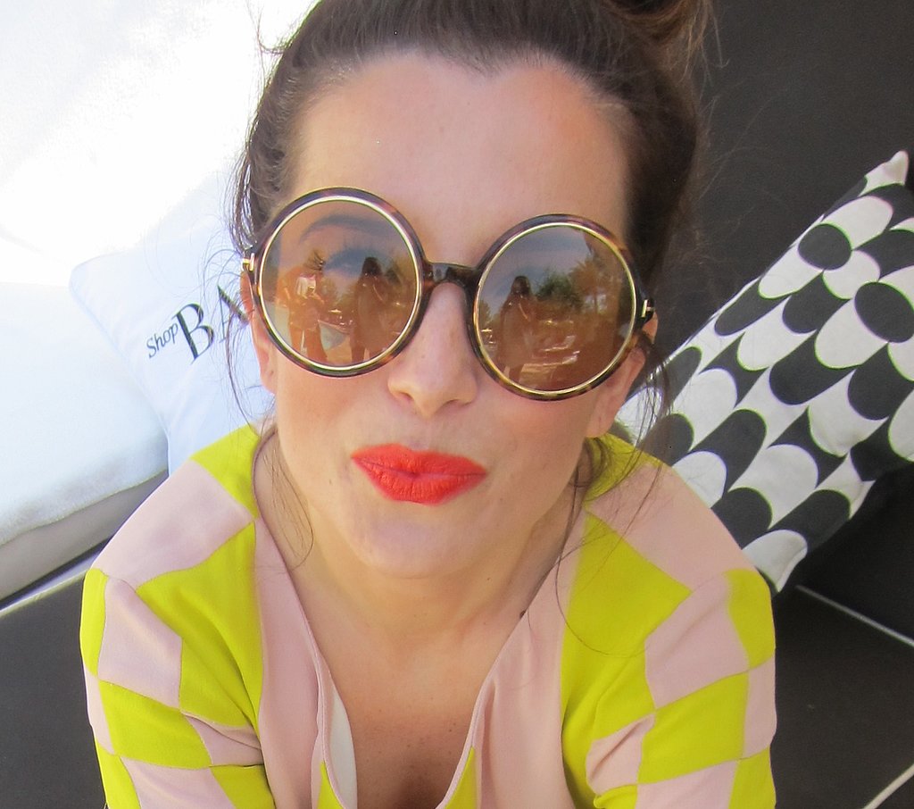 Eccentric and iconic big round glasses are even more powerful when coupled with a bright coral lip.
Photo: Meg Cuna
Eccentric and iconic big round glasses are even more powerful when coupled with a bright coral lip.
Photo: Meg Cuna