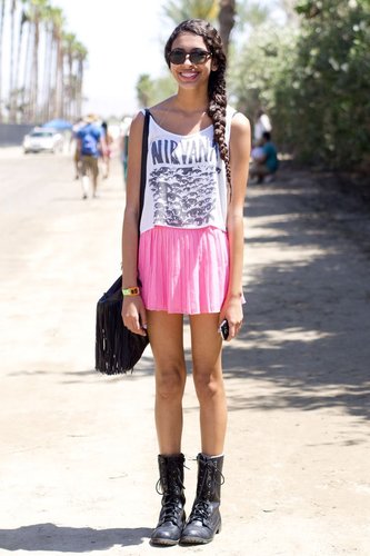 A girlie rocker look made up of a Nirvana tee, hot-pink skirt, and tough moto boots.
A girlie rocker look made up of a Nirvana tee, hot-pink skirt, and tough moto boots.