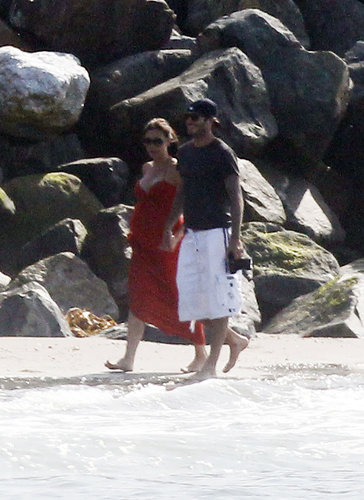 David and Victoria Beckham walked arm in arm on the beach in Malibu in July 2011.
David and Victoria Beckham walked arm in arm on the beach in Malibu in July 2011.