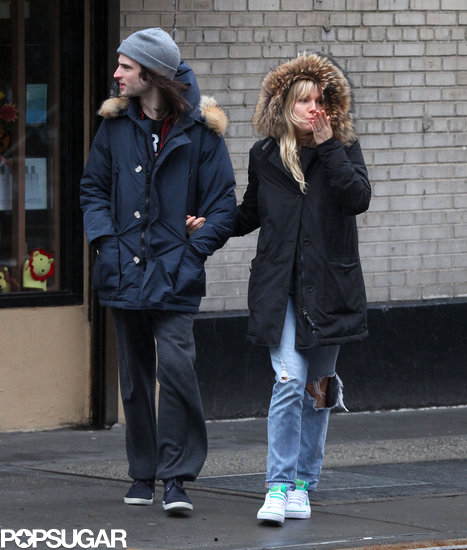 Sienna Miller held onto Tom Sturridge for a couple's stroll in NYC.
Sienna Miller held onto Tom Sturridge for a couple's stroll in NYC.