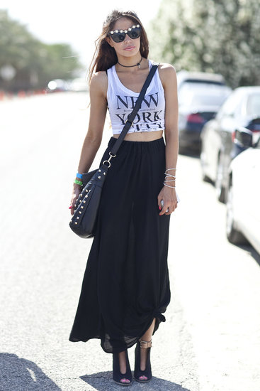 This Coachella party attendee showed off her city cred in black maxi, NYC tank, and tough accessories.
This Coachella party attendee showed off her city cred in black maxi, NYC tank, and tough accessories.