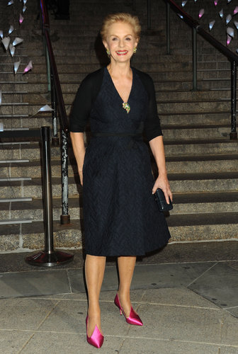 Carolina Herrera punched up her sleek black knee-length cocktail dress with bright pink satin kitten heels.
Carolina Herrera punched up her sleek black knee-length cocktail dress with bright pink satin kitten heels.