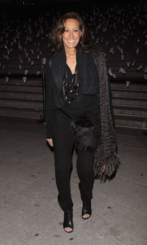Donna Karan wore her signature head-to-toe black, and punctuated the dark ensemble with a bold stone-bead necklace and a textured scarf.
Donna Karan wore her signature head-to-toe black, and punctuated the dark ensemble with a bold stone-bead necklace and a textured scarf.
