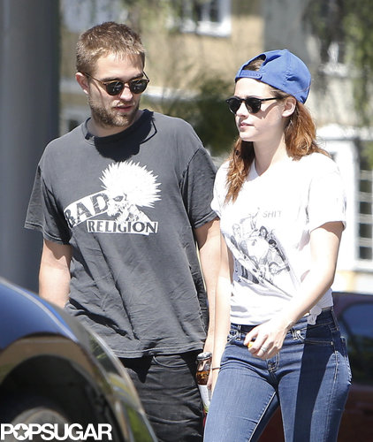 Robert Pattinson Gets Cute With His Pup During an Outing With Kristen Stewart Robert Pattinson Gets Cute With His Pup During an Outing With Kristen Stewart