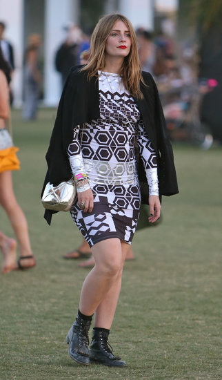 Mischa Barton wore a geometric-print dress with combat boots, a black coat, and a gold metallic bag at Coachella.
Mischa Barton wore a geometric-print dress with combat boots, a black coat, and a gold metallic bag at Coachella.