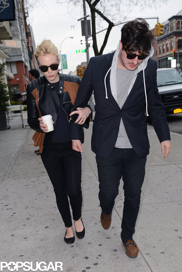 Carey Mulligan held Marcus Mumford's arm as they walked down the street.
Carey Mulligan held Marcus Mumford's arm as they walked down the street.