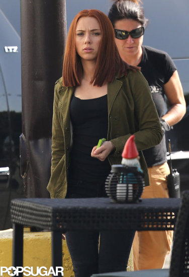 Scarlett Johansson shows off her red hair on her Captain America: The Winter Soldier set.
Scarlett Johansson shows off her red hair on her Captain America: The Winter Soldier set.