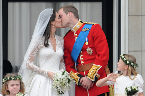 Kate Middleton and Prince William sealed their love with a kiss after their April 2011 wedding in London.
Kate Middleton and Prince William sealed their love with a kiss after their April 2011 wedding in London.