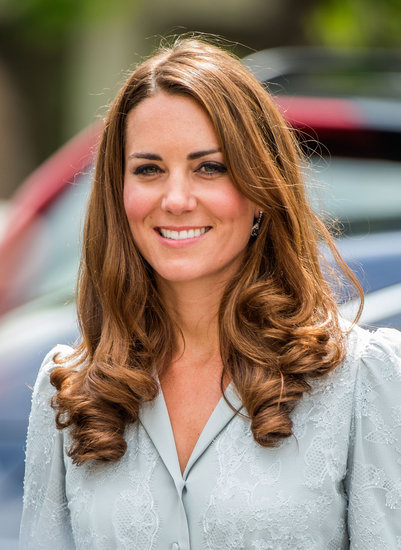 Her blowout was adorned with bouncy curls during the queen's Diamond Jubilee Tour in 2012.
Her blowout was adorned with bouncy curls during the queen's Diamond Jubilee Tour in 2012.