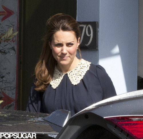 Kate Middleton wore a navy blouse with a white collar.
Kate Middleton wore a navy blouse with a white collar.