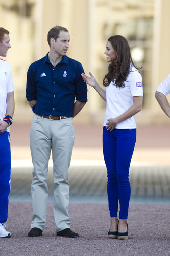 The royal couple coordinated in blues and sportier attire to watch the Olympic torch arrive at Buckingham Palace.
The royal couple coordinated in blues and sportier attire to watch the Olympic torch arrive at Buckingham Palace.