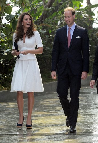 The Duchess of Cambridge repeated her crisp white Alexander McQueen ensemble — seen first at the Order of the Garter service — for an appearance in Singapore during their Diamond Jubilee tour.
The Duchess of Cambridge repeated her crisp white Alexander McQueen ensemble — seen first at the Order of the Garter service — for an appearance in Singapore during their Diamond Jubilee tour.