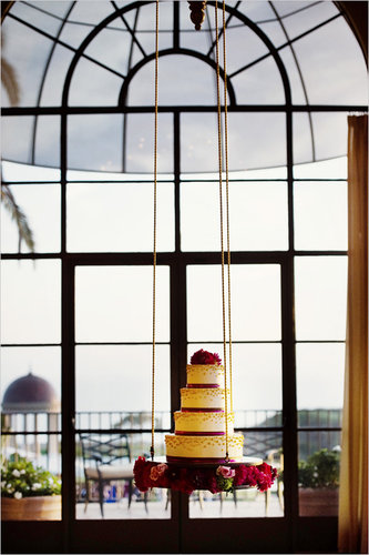 You may not have ever seen a hanging cake before, but this one's tiered shape and ribbon-like, beaded texture is familiar in the best way possible.
Photo by Chenin Boutwell via Wedding Chicks
You may not have ever seen a hanging cake before, but this one's tiered shape and ribbon-like, beaded texture is familiar in the best way possible.
Photo by Chenin Boutwell via Wedding Chicks