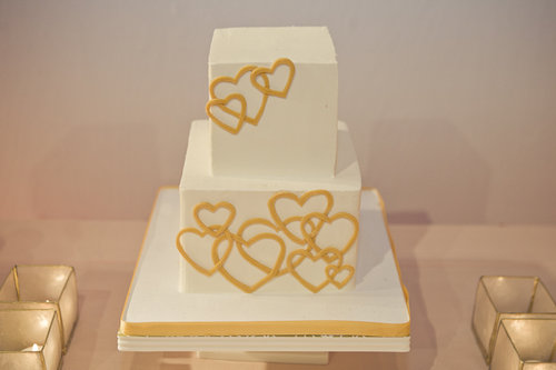 At its core, this cake is pretty simple (two square tiers), but we love how this no-fuss heart design adds instant pizzazz.
Photo by Megan Hartley Photography via Wedding Chicks
At its core, this cake is pretty simple (two square tiers), but we love how this no-fuss heart design adds instant pizzazz.
Photo by Megan Hartley Photography via Wedding Chicks