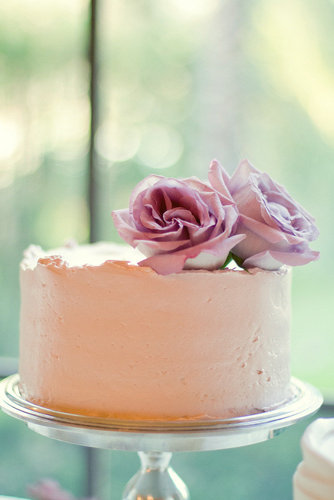 How sweet is this one-tiered blush cake topped with lavender roses? It's almost too pretty to eat (emphasis on almost) and leaves room to serve other treats like cupcakes and cake pops.
Photo by Closer to Love Photography via Style Me Pretty
How sweet is this one-tiered blush cake topped with lavender roses? It's almost too pretty to eat (emphasis on almost) and leaves room to serve other treats like cupcakes and cake pops.
Photo by Closer to Love Photography via Style Me Pretty