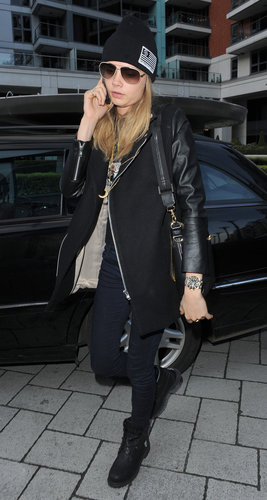 Cara Delevingne was tough in London in all black: a leather-sleeved jacket, skinny denim, a ribbed beanie, and combat boots.
Cara Delevingne was tough in London in all black: a leather-sleeved jacket, skinny denim, a ribbed beanie, and combat boots.
