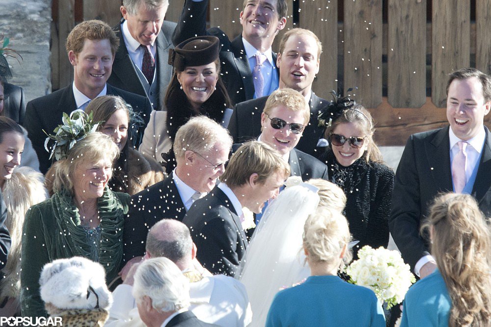 Prince Harry, Kate Middleton, and Prince William watched the rice fly during a Swiss wedding ceremony in March 2013.
Prince Harry, Kate Middleton, and Prince William watched the rice fly during a Swiss wedding ceremony in March 2013.