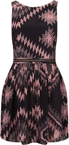 Bold ikat print makes this Topshop printed pinafore dress ($72) particularly festive and the open back might just make it one of our favorite finds for Summer.
Bold ikat print makes this Topshop printed pinafore dress ($72) particularly festive and the open back might just make it one of our favorite finds for Summer.
