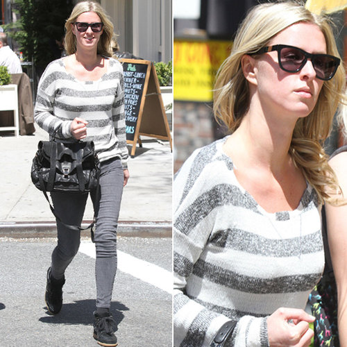 Nicky Hilton strolled NYC in an all-gray ensemble with black accessories — leather Proenza Schouler satchel, Isabel Marant sneakers, and Childen of California ($180) sunglasses by Westward Leaning.
Nicky Hilton strolled NYC in an all-gray ensemble with black accessories — leather Proenza Schouler satchel, Isabel Marant sneakers, and Childen of California ($180) sunglasses by Westward Leaning.
