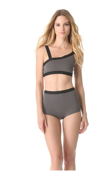 This asymmetrical two-toned VPL Neoprene Bikini ($125) has two traditional straps over the shoulders and two across the back.
This asymmetrical two-toned VPL Neoprene Bikini ($125) has two traditional straps over the shoulders and two across the back.