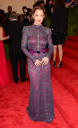 Carolina Herrera dressed Minka Kelly in a sheer lace gown with a bejeweled neckline, while Lorraine Schwartz dripped her in jewels.
Carolina Herrera dressed Minka Kelly in a sheer lace gown with a bejeweled neckline, while Lorraine Schwartz dripped her in jewels.