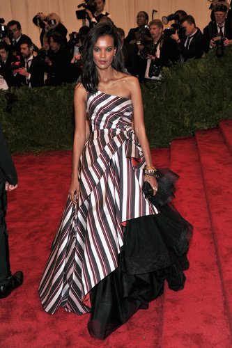 Liya Kebede rocked a striped Alberta Ferretti one-shouldered gown with a bevy of bracelets.
Liya Kebede rocked a striped Alberta Ferretti one-shouldered gown with a bevy of bracelets.