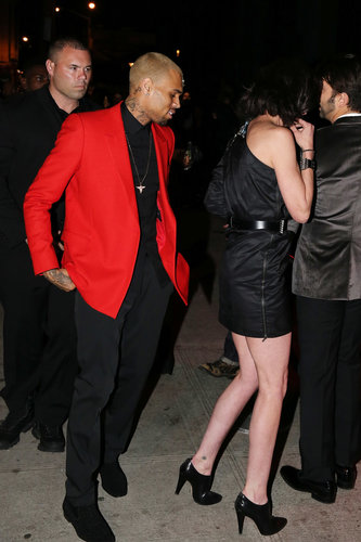Chris Brown arrived at the afterparty in a red coat.
Chris Brown arrived at the afterparty in a red coat.