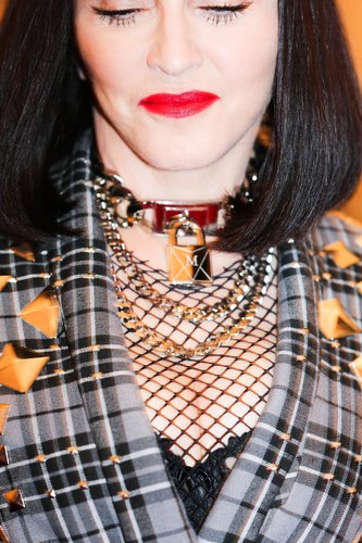 Madonna wore a gold choker with a monogrammed lock.
Photo: Julian Mackler BFAnyc.com
Madonna wore a gold choker with a monogrammed lock.
Photo: Julian Mackler BFAnyc.com