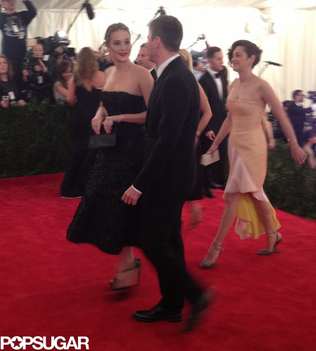 Jennifer Lawrence entered with her posse repping Dior, including Marion Cotillard.
Jennifer Lawrence entered with her posse repping Dior, including Marion Cotillard.