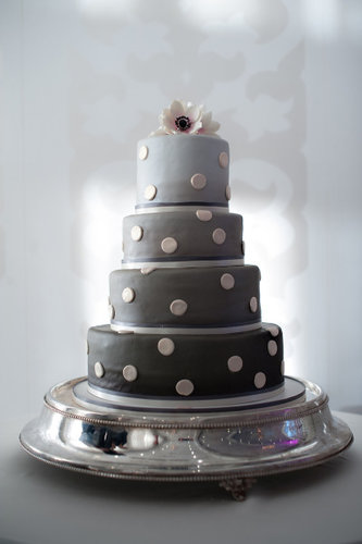 Ombré gray tiers modernize this cake's polka-dot detail.
Photo by Steve DePino via Style Me Pretty
Ombré gray tiers modernize this cake's polka-dot detail.
Photo by Steve DePino via Style Me Pretty
