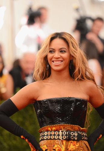 Beyoncé accessorized her custom Givenchy look with a tough-girl belt, dramatic elbow-length gloves, and Lorraine Schwartz jewels.
Beyoncé accessorized her custom Givenchy look with a tough-girl belt, dramatic elbow-length gloves, and Lorraine Schwartz jewels.