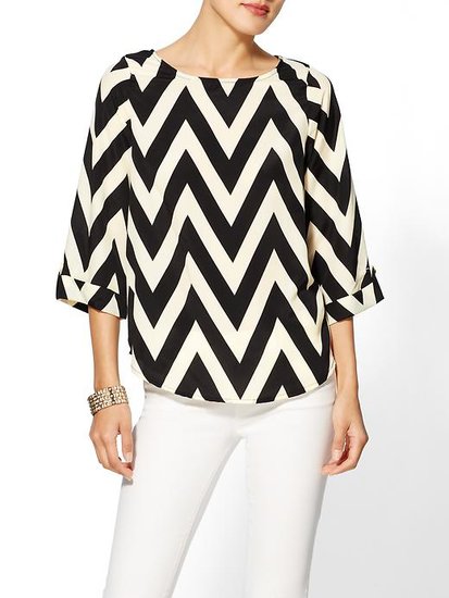 Chevron addicts can indulge the passion with Everly's graphic blouse ($49). The strong lines create a statement that's anything but an optical fashion illusion.
Chevron addicts can indulge the passion with Everly's graphic blouse ($49). The strong lines create a statement that's anything but an optical fashion illusion.