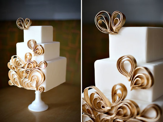 This modern cake has a bit of whimsy with graphic gold detail that pops against the cake's white fondant.
Photo by Jasmine Star via Green Wedding Shoes
This modern cake has a bit of whimsy with graphic gold detail that pops against the cake's white fondant.
Photo by Jasmine Star via Green Wedding Shoes