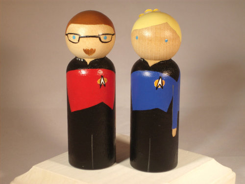 Sweet and simple, wooden doll toppers like this Trekkie pair ($68) will add a fun touch to your big day.
Sweet and simple, wooden doll toppers like this Trekkie pair ($68) will add a fun touch to your big day.