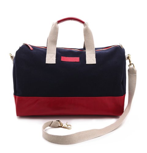 The classic color trio on this Clare Vivier Adam weekender bag ($378) will lend a sporty flair to anything it touches.
The classic color trio on this Clare Vivier Adam weekender bag ($378) will lend a sporty flair to anything it touches.