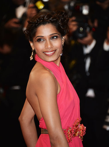 Freida Pinto wore a bevy of braids in her hair to create a striking woven updo at The Great Gatsby premiere.
Freida Pinto wore a bevy of braids in her hair to create a striking woven updo at The Great Gatsby premiere.