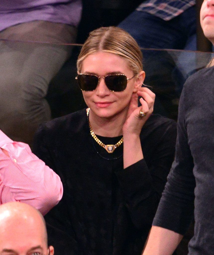 Leave it to Ashley Olsen to look ultrachic at the same New York Knicks playoff game. She sported her signature all-black, then added a gold necklace, pinkie ring, and aviator sunglasses.
Leave it to Ashley Olsen to look ultrachic at the same New York Knicks playoff game. She sported her signature all-black, then added a gold necklace, pinkie ring, and aviator sunglasses.