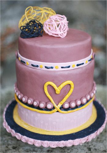 It's all about the sweet details when it comes to this purple, memorable cake, from the heart to the buttons and everything in between.
Photo by Diana Marie Photography via Wedding Chicks
It's all about the sweet details when it comes to this purple, memorable cake, from the heart to the buttons and everything in between.
Photo by Diana Marie Photography via Wedding Chicks