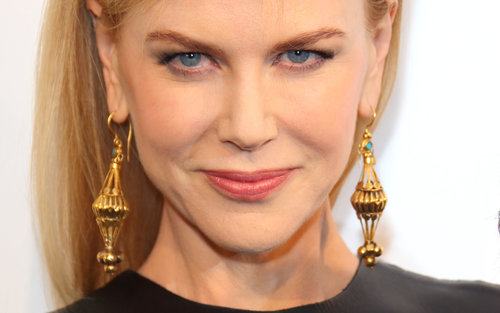 Nicole Kidman wore ornate gold earrings.
Nicole Kidman wore ornate gold earrings.