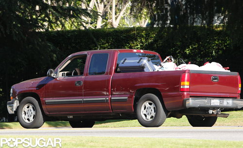 Robert Pattinson's truck was full of trash bags.
Robert Pattinson's truck was full of trash bags.