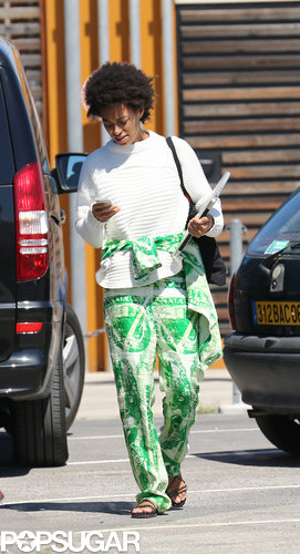 Solange Knowles wore bright green pants for the yacht day.
Solange Knowles wore bright green pants for the yacht day.