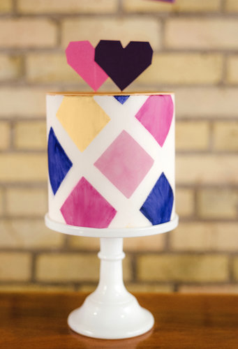 The bold pattern of this fun cake is made even sweeter topped with pixel-like hearts.
Photo by Jeff Loves Jessica via 100 Layer Cake
The bold pattern of this fun cake is made even sweeter topped with pixel-like hearts.
Photo by Jeff Loves Jessica via 100 Layer Cake