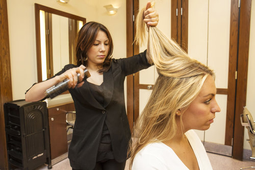 If you're starting off on straight hair (or just want the perfect beach waves), apply a flexible-hold hair spray to your layers before running a curling iron through your hair. This step helps your hair not only hold the style, but also helps with frizz.
If you're starting off on straight hair (or just want the perfect beach waves), apply a flexible-hold hair spray to your layers before running a curling iron through your hair. This step helps your hair not only hold the style, but also helps with frizz.